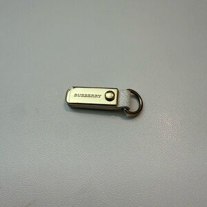 Burberry Gold and White zipper pull